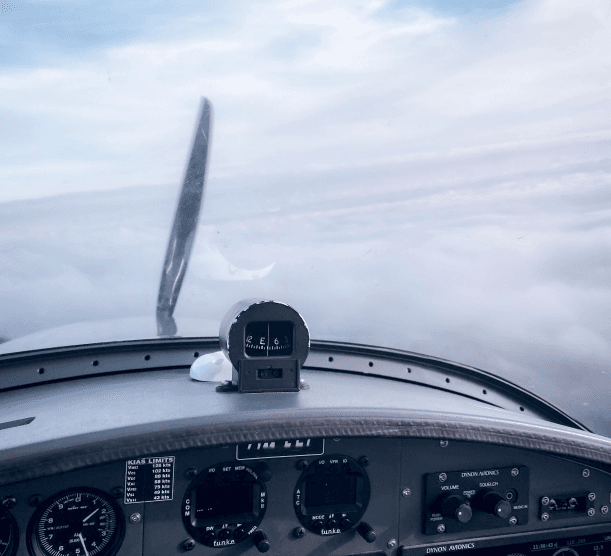View from a Cockpit out in the cloudy sky